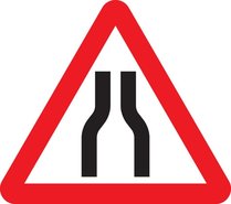 Road narrows on both sides